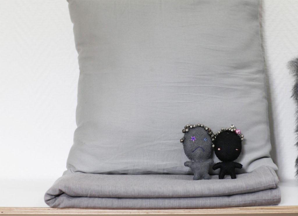 Mini puppet japanese style cuddle light toys NUIGURUMI on grey blanket