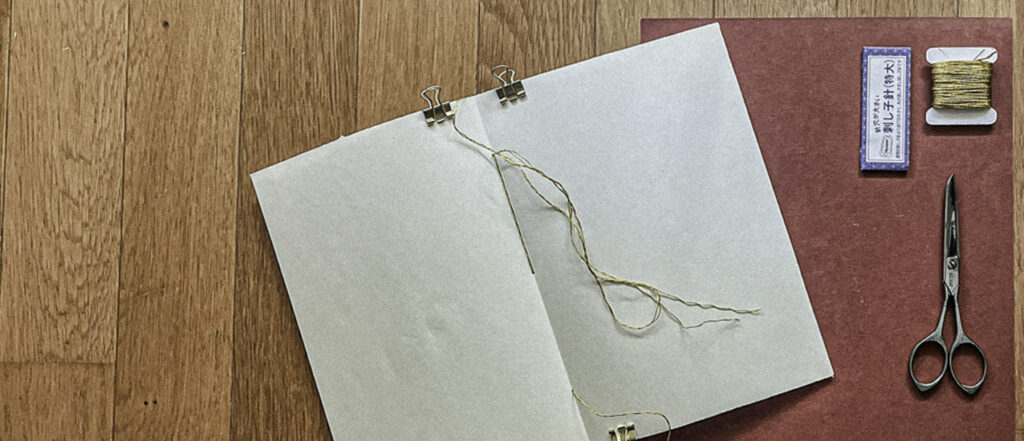 This is how (NØ) came to sew a tiny booklet by hand. A sketchbook, maybe. A notebook, perhaps. Or simply a space waiting to be filled—stitched gently, page by page, into being.