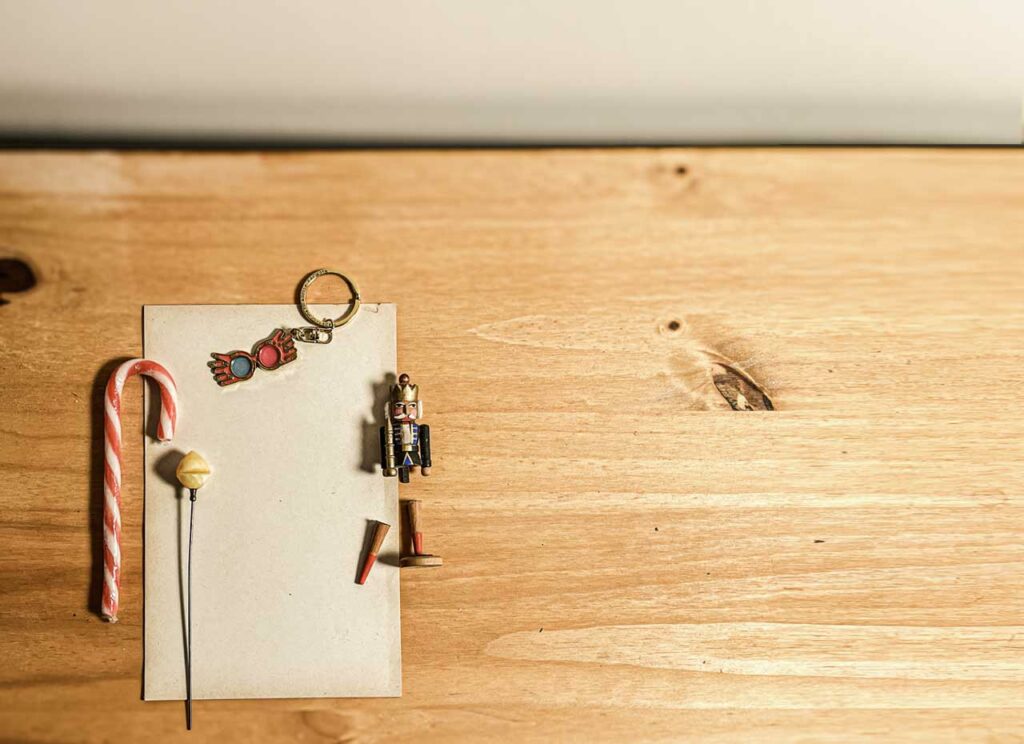 A broken nutcracker, a Hat pin still sharp, a sugar stick wrapped in its own nostalgia, Paper from my grandmother, pale and untouched for years and goggles to see what can’t be seen: the Nargel, for the one who knows…