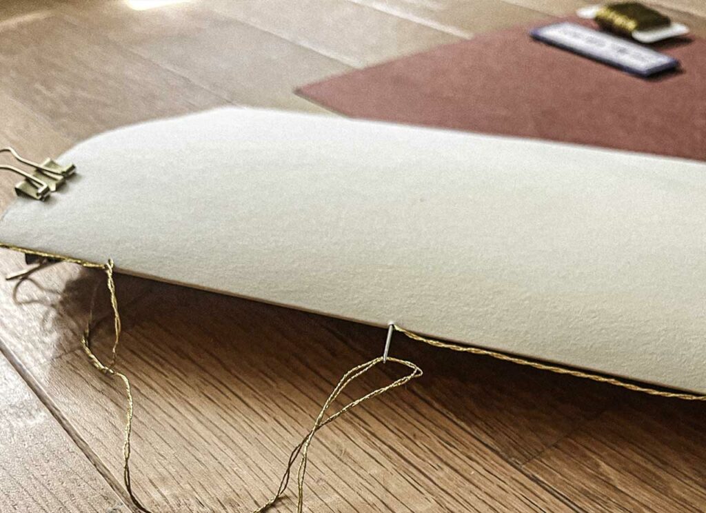 Continue sewing the whole booklet